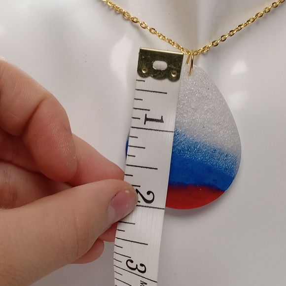 Elegant Gold Chain Necklace with Red, Blue, and White Pendant - Picture 4 of 6